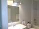 Bathroom featuring a tub and shower combination, a sink, and a toilet at 2451 Strandhill St, Orlando, FL 32824