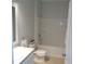 Bathroom featuring a tub and shower combination, a sink, and a toilet at 2451 Strandhill St, Orlando, FL 32824