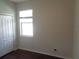 Bedroom features a bright window, closet and light walls over hard wood floors at 2451 Strandhill St, Orlando, FL 32824