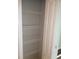 A linen closet with white wire shelving offers lots of storage at 2451 Strandhill St, Orlando, FL 32824