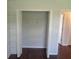 A walk-in closet with an open door and standard shelving is seen at 2451 Strandhill St, Orlando, FL 32824
