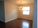 Dining area with a modern light fixture and natural light at 2451 Strandhill St, Orlando, FL 32824
