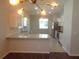 Well-equipped kitchen featuring granite countertops, modern appliances, and ample counter space at 2451 Strandhill St, Orlando, FL 32824