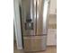Stainless steel refrigerator with water dispenser in kitchen at 2451 Strandhill St, Orlando, FL 32824