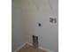 A closer view of the laundry room showing the water and drain hookups at 2451 Strandhill St, Orlando, FL 32824