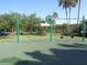 Community playground with swings, trees, and picnic tables at 2451 Strandhill St, Orlando, FL 32824