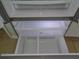 Close-up of the refrigerator's lower freezer section, featuring organized pull-out drawers for efficient storage at 2451 Strandhill St, Orlando, FL 32824
