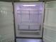 Spacious, clean refrigerator interior with adjustable shelves and door storage, ready for your groceries at 2451 Strandhill St, Orlando, FL 32824