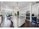 Open-concept kitchen with a center island, stainless steel appliances, and pendant lighting at 2487 River Tree Cir, Sanford, FL 32771