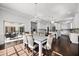Open floor plan showing the kitchen and dining area, filled with natural light and elegant furnishings at 2487 River Tree Cir, Sanford, FL 32771