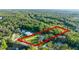 Highlighted land area showcasing available property in a lush, wooded setting with mature trees at 2487 River Tree Cir, Sanford, FL 32771