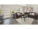 Comfortable living room with natural light, a cozy couch, and modern decor at 2603 E Marks St, Orlando, FL 32803