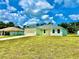 Inviting single-story home with a well-manicured lawn and a convenient two-car garage at 2645 Sw 155Th Ln, Ocala, FL 34473