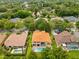 View of the backyard pool, lounge area and neighborhood at 283 Lakay Pl, Longwood, FL 32779