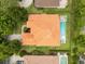 Aerial view of house featuring a private swimming pool and tile roof at 283 Lakay Pl, Longwood, FL 32779