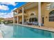 A large inground pool is surrounded by comfortable patio furniture and offers a relaxing outdoor retreat at 283 Lakay Pl, Longwood, FL 32779