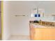 Bathroom featuring a granite countertop, sink, and gold fixtures at 283 Lakay Pl, Longwood, FL 32779