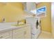 Laundry room with modern washer and dryer, a sink, and a window at 283 Lakay Pl, Longwood, FL 32779