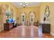 Bright office with hardwood floors, decorative window treatments, and work station at 283 Lakay Pl, Longwood, FL 32779