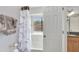 Bathroom with a tub-shower combination and bright window at 3038 Golden Rock Dr, Orlando, FL 32818