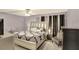 Cozy bedroom featuring stylish decor, luxury bed frame and accent furniture at 3038 Golden Rock Dr, Orlando, FL 32818