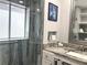 Bathroom featuring a sleek shower, granite countertops, and lots of storage at 316 Dornoch Ct, Winter Springs, FL 32708