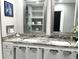 Updated bathroom with dual sinks, granite countertops and updated hardware and plenty of storage at 316 Dornoch Ct, Winter Springs, FL 32708