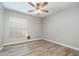 Bedroom features ceiling fan, tile flooring, and a window with blinds at 316 Dornoch Ct, Winter Springs, FL 32708