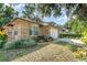 Attractive brick home boasting a two-car garage, well-kept lawn, and inviting curb appeal at 316 Dornoch Ct, Winter Springs, FL 32708