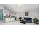Open concept living and kitchen area featuring vaulted ceilings and lots of natural light at 316 Dornoch Ct, Winter Springs, FL 32708