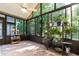 Sunroom with ceiling fan, and lots of plants, flooded with natural light at 316 Dornoch Ct, Winter Springs, FL 32708