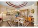 Charming dining area with natural lighting, traditional furniture, and stylish decor at 3551 Statham Dr, Apopka, FL 32712