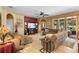 Inviting living room with a fireplace and sliding doors to the outdoor area at 3551 Statham Dr, Apopka, FL 32712