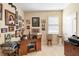 Functional home office space with a desk, chair, and ample natural light at 3551 Statham Dr, Apopka, FL 32712