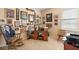 Versatile home office space with natural light and comfortable seating at 3551 Statham Dr, Apopka, FL 32712