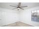 Bedroom with ceiling fan, window and two closet doors at 380 Lake Ontario Ct # 304, Altamonte Springs, FL 32701