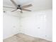 Cozy bedroom with a ceiling fan and three doors at 380 Lake Ontario Ct # 304, Altamonte Springs, FL 32701