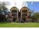 Charming multi-Gathering home with brick accents, double balconies, and inviting curb appeal at 380 Lake Ontario Ct # 304, Altamonte Springs, FL 32701