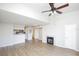 Bright, open living space featuring wood floors and fireplace at 380 Lake Ontario Ct # 304, Altamonte Springs, FL 32701