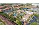 Aerial view of a resort pool and surrounding villas and amenities on a sunny day at 412 Verona Ave, Davenport, FL 33897