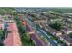 Overhead view of a section of the community, showing numerous multi-Gathering buildings, landscaping, and roadways at 412 Verona Ave, Davenport, FL 33897