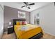 Cozy bedroom with a comfortable bed, stylish nightstands, and ample natural light at 412 Verona Ave, Davenport, FL 33897