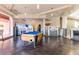 Community game room featuring a pool table, arcade games, and ice cream parlor at 412 Verona Ave, Davenport, FL 33897