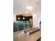 Contemporary dining area with stylish pendant lighting and seating for eight, perfect for gatherings at 4161 Paragraph Dr, Kissimmee, FL 34746