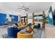 Open-concept living room with view of dining room and a view of the outdoors at 4161 Paragraph Dr, Kissimmee, FL 34746