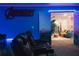 Entertain guests in style with this Avengers-themed theater room that leads to a cozy upstairs living space at 4161 Paragraph Dr, Kissimmee, FL 34746