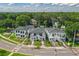 Three new modern homes with two stories, black trim and gray roofs sit in a desirable location at 523 W Princeton St # 1, Orlando, FL 32804