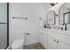 Modern bathroom with dual vanities, sleek fixtures, and a glass-enclosed shower at 523 W Princeton St # 1, Orlando, FL 32804