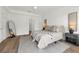 Comfortable bedroom featuring neutral tones, a large bed, and stylish decor at 523 W Princeton St # 1, Orlando, FL 32804