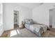 Cozy bedroom showcases a comfy bed with wood flooring at 523 W Princeton St # 1, Orlando, FL 32804